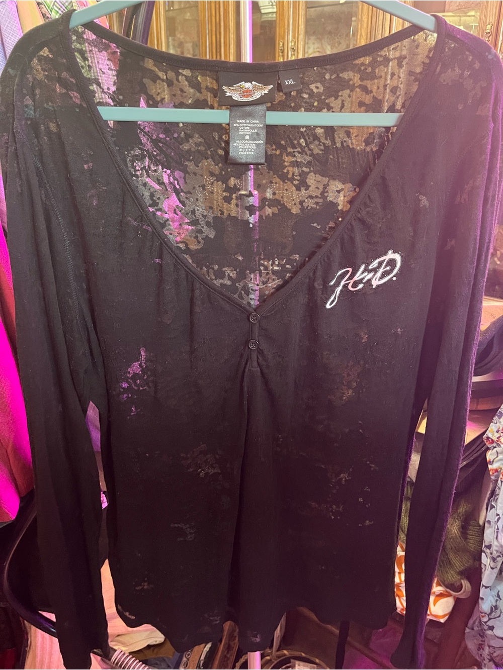 Harley Davidson Black Women’s Long-Sleeve Sheer V-Neck Top with logo.